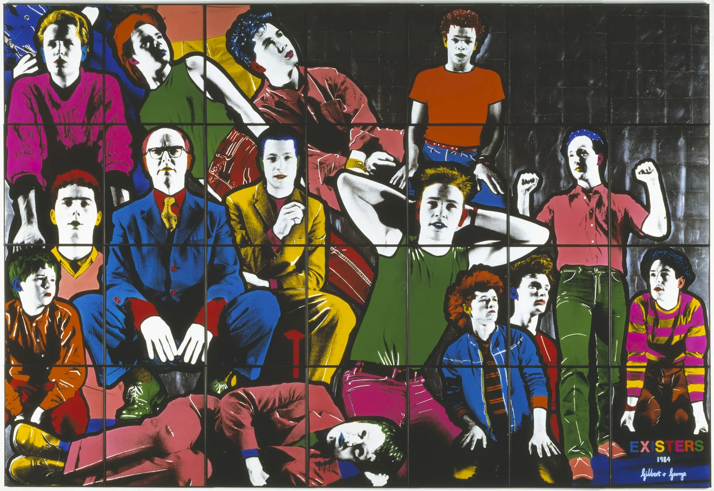 EXISTERS, 1984, by Gilbert & George: a large multi-panel grid of brightly coloured photographs of young men and boys, with George in glasses and a blue suit and Gilbert in a yellow suit seated among them, and the title EXISTERS lettered in the bottom right corner