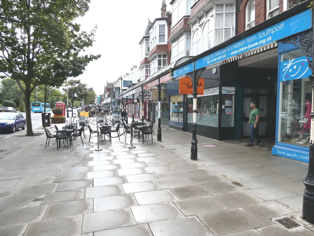 Lord Street, Southport, in 2021. Retail and hospitality are among the borough's largest employers. No claim is made about any business shown.